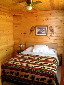 Aspen Cabin at Cedar Point Resort queen bedroom