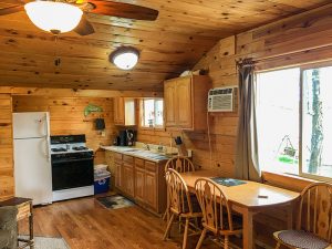 Maple Cabin at Cedar Point Resort open kitchen and dining table